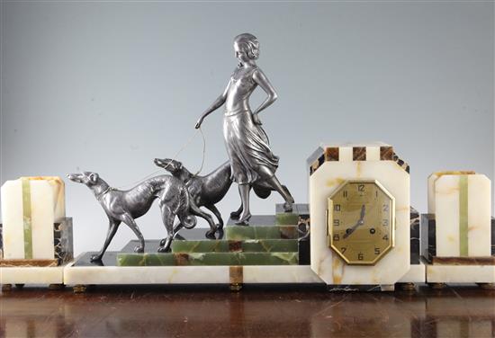 A French Art Deco silvered metal and marble clock garniture, clock W.24in.